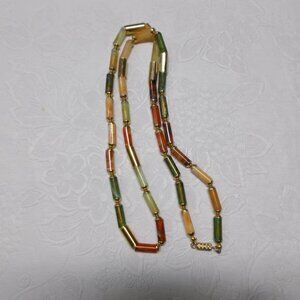 Multi-color tube necklace with green, tans and gold colors,  15" long